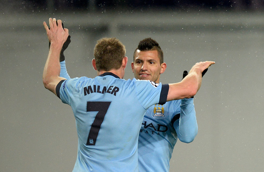 Sergio Aguero embraces James Milner
