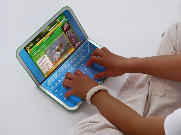 The new OLPC machine features a pair of touch screens.