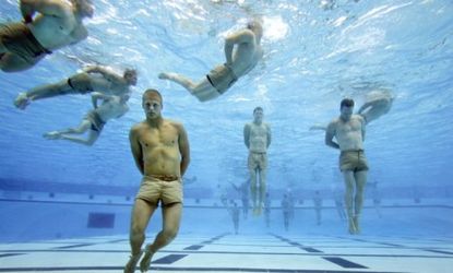 Navy SEALs, tied at the hands and feet, take part in a training exercise: The Team Six SEALs, who killed bin Laden, exist largely outside of military protocol.