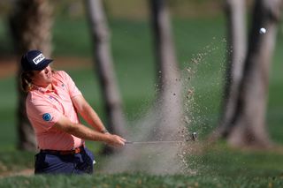 Neal Shipley hits a bunker shot