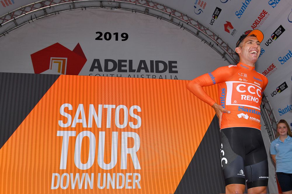 Patrick Bevin on the Tour Down under podium after wining stage 2 and taking the overall lead
