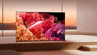 Sony Bravia X95k MIni LED TV with a sunset in the background