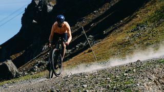 Graham drifting a gravel bike in the Dolomites