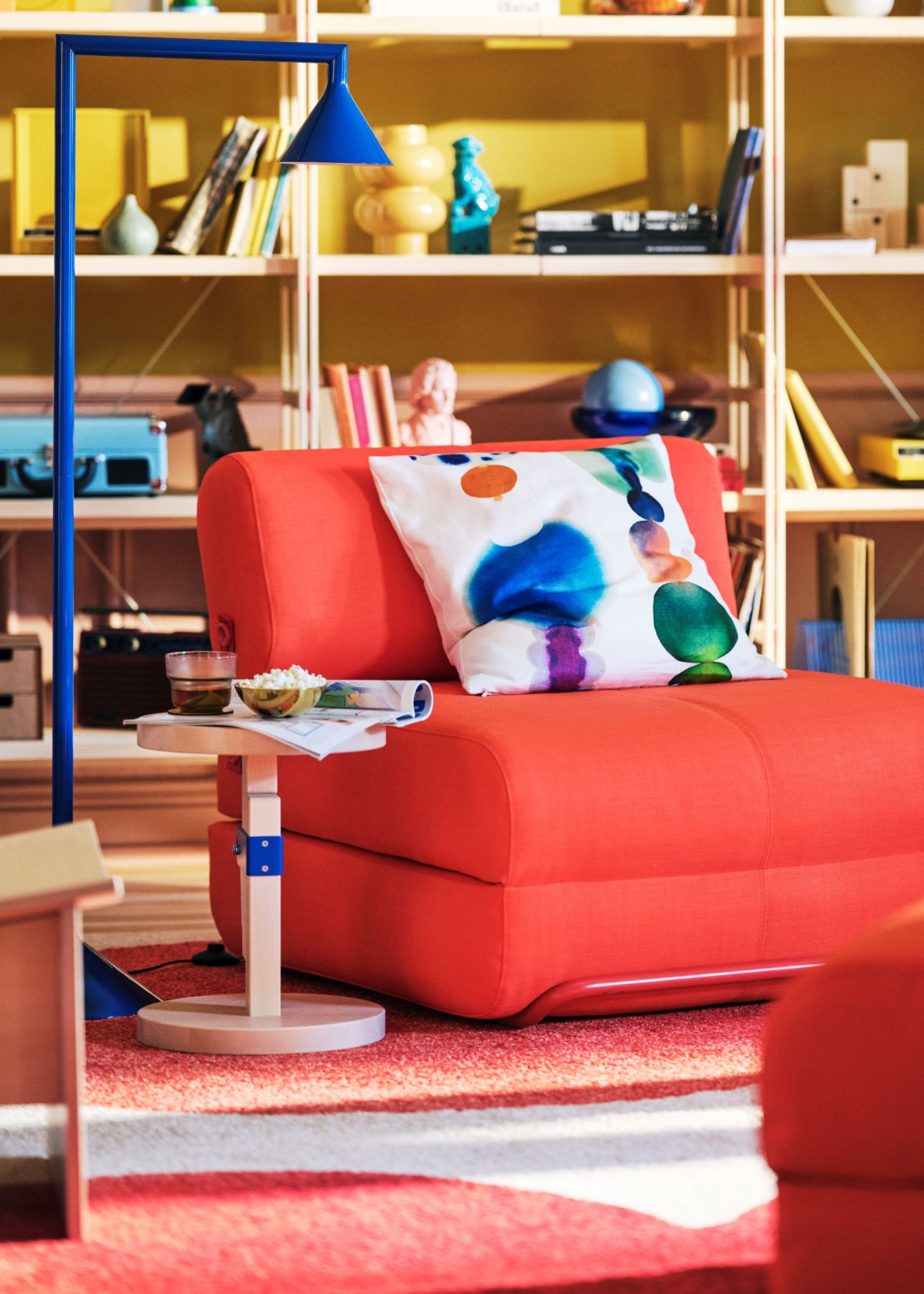 IKEA PS Collection chair bed in red and flexible lamp in blue