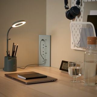 IKEA's SKOTAT extension cord used on a home office desk