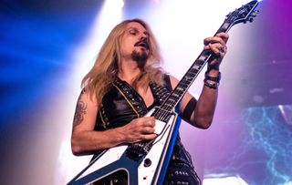 Richie Faulkner performs onstage with Judas Priest at the Toyota Arena in Ontario, California on November 7, 2022