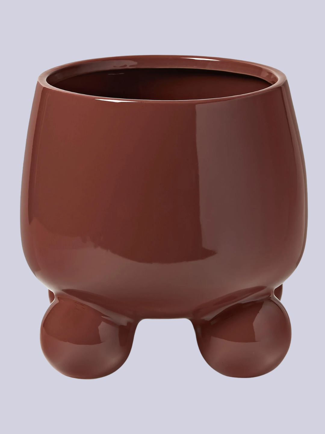 A glossy brown boobin-foot planter from Westwing
