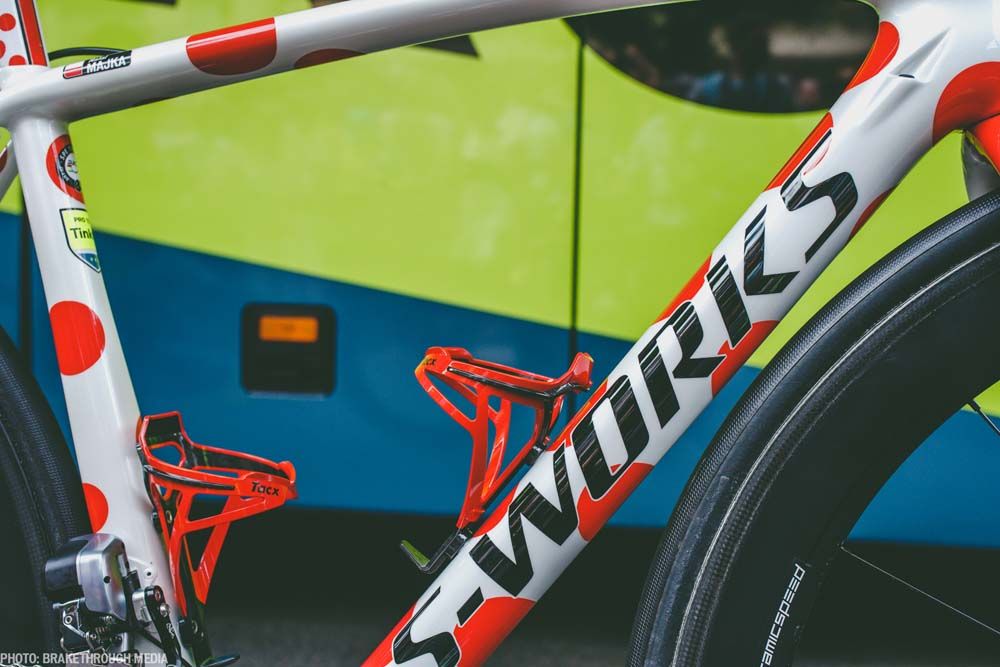 Red bottle cages and bar tape complete the decorations