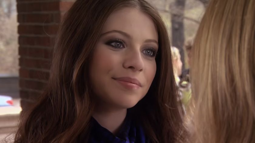 Michelle Trachtenberg smiling as Regina in her first Gossip Girl scene