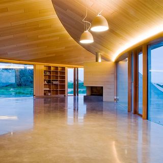 crofthouse curved pebble shaped design and sleek interior