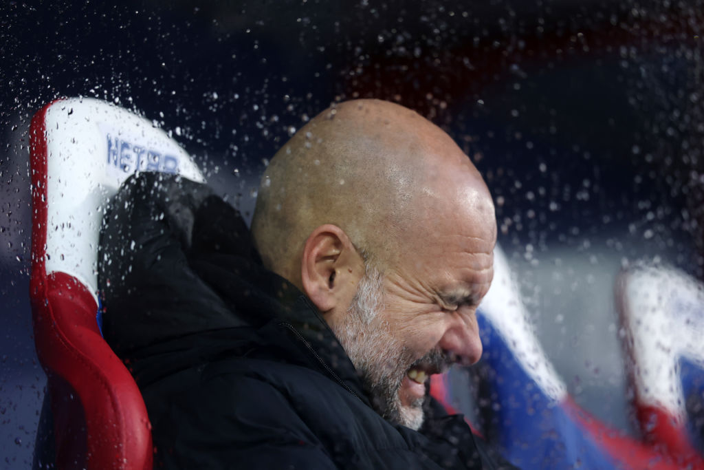 Pep Guardiola, Manager of Manchester City, reacts prior to the Premier League match between Crystal Palace FC and Manchester City FC at Selhurst Park on December 07, 2024 in London, England.