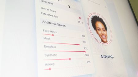 A screen showing Sumsub's home page with face verification analysis.