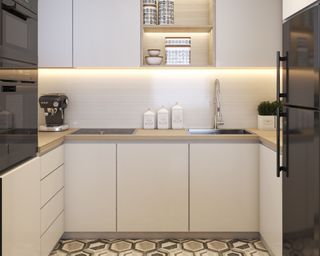 White kitchen with lights under cabinets