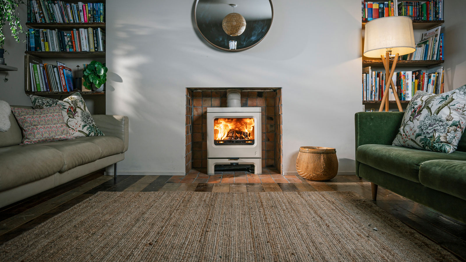 log burning stove in living room with rug