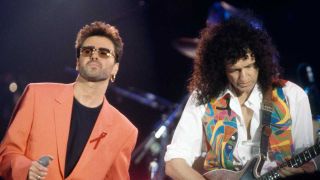 George Michael onstage with Brian May