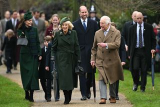 Kate Middleton wears a long green coat, matching hat, and tartan scarf to attend church at Sandringham on Christmas Day