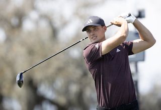 Ludvig Aberg hits a tee shot with a driver