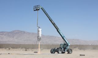 Xaero-B, a prototype launch vehicle built by the company Masten Space Systems in Mojave, California, takes a tethered test flight in this image released on July 17, 2014. Masten Space Systems is one of three companies working on designs for the U.S. milit