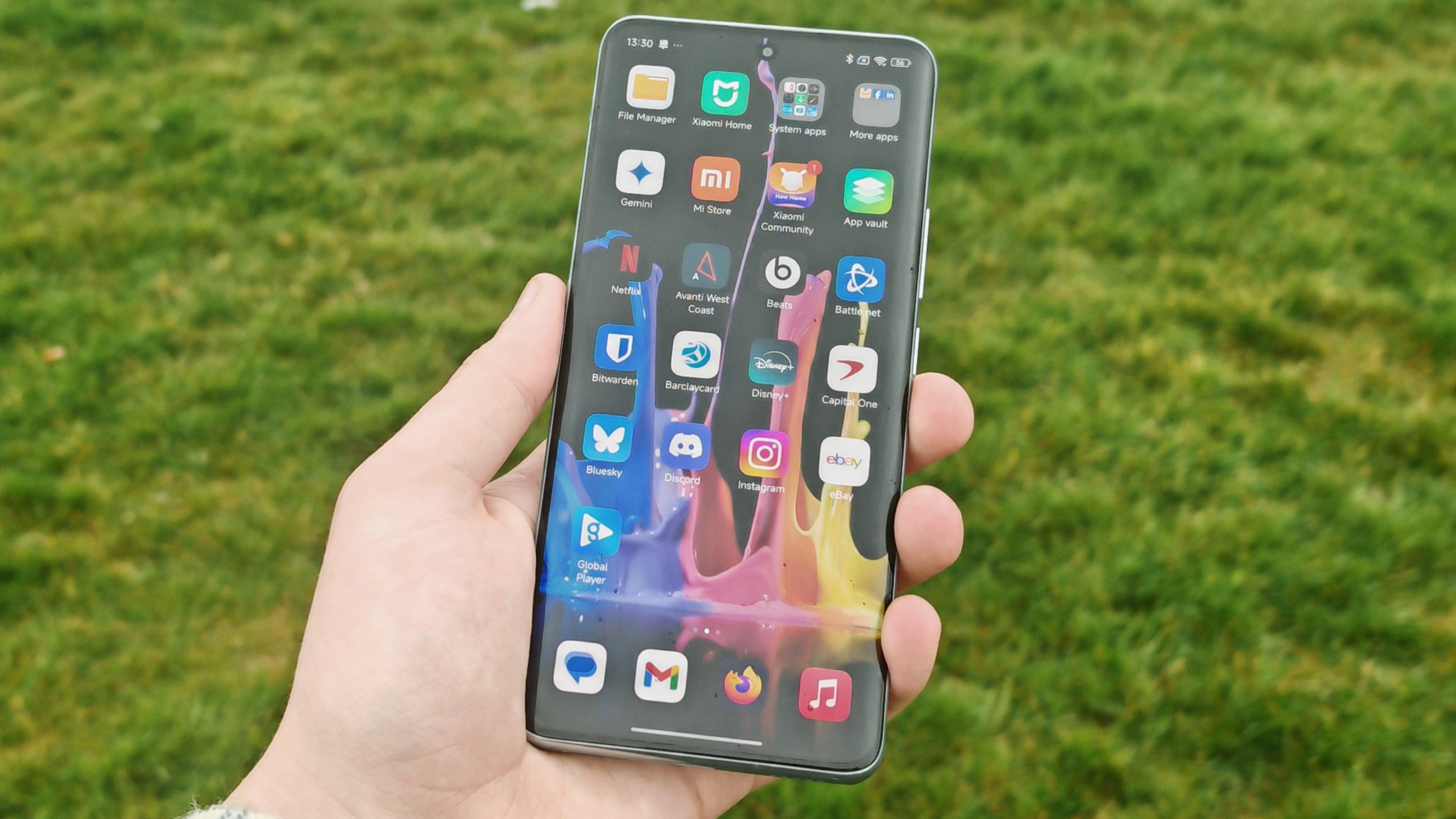 Xiaomi Redmi Note 14 Pro Plus 5G phone in hand and on grass showing homescreens and cameras up close