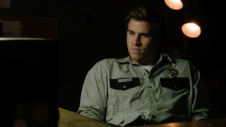 Liam Hemsworth as Chris Potamitis in Empire State