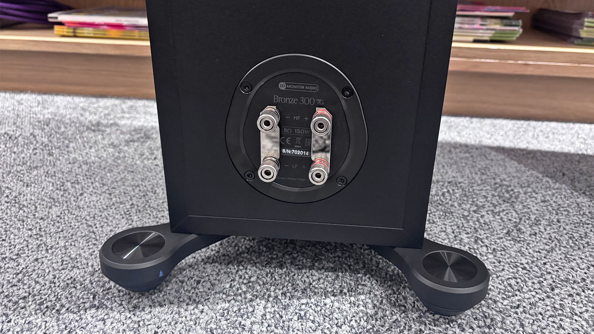 Monitor Audio Bronze 300 7G floorstanding speakers on grey carpet detail of rear binding posts
