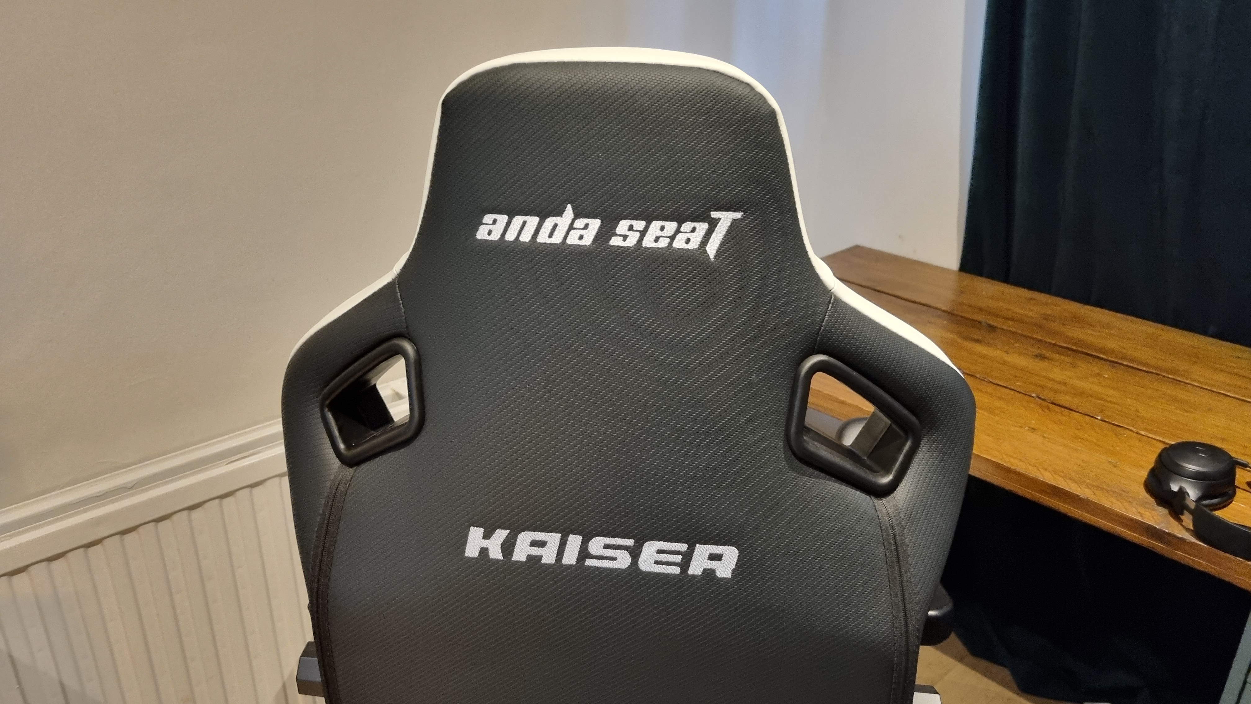 The rear seat backing material on the AndaSeat Kaiser 4 XL