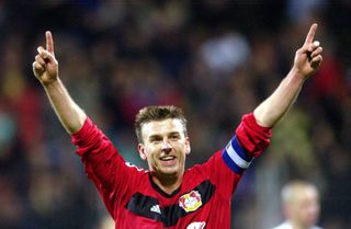 Bernd Schneider celebrates a goal for Bayer Leverkusen against Olympiakos in the Champions League in October 2002.