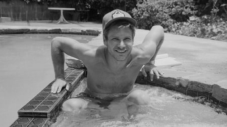 harrison ford in his pool in the '80s