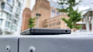 The Sony Xperia 1 V from the top edge on a metal surface