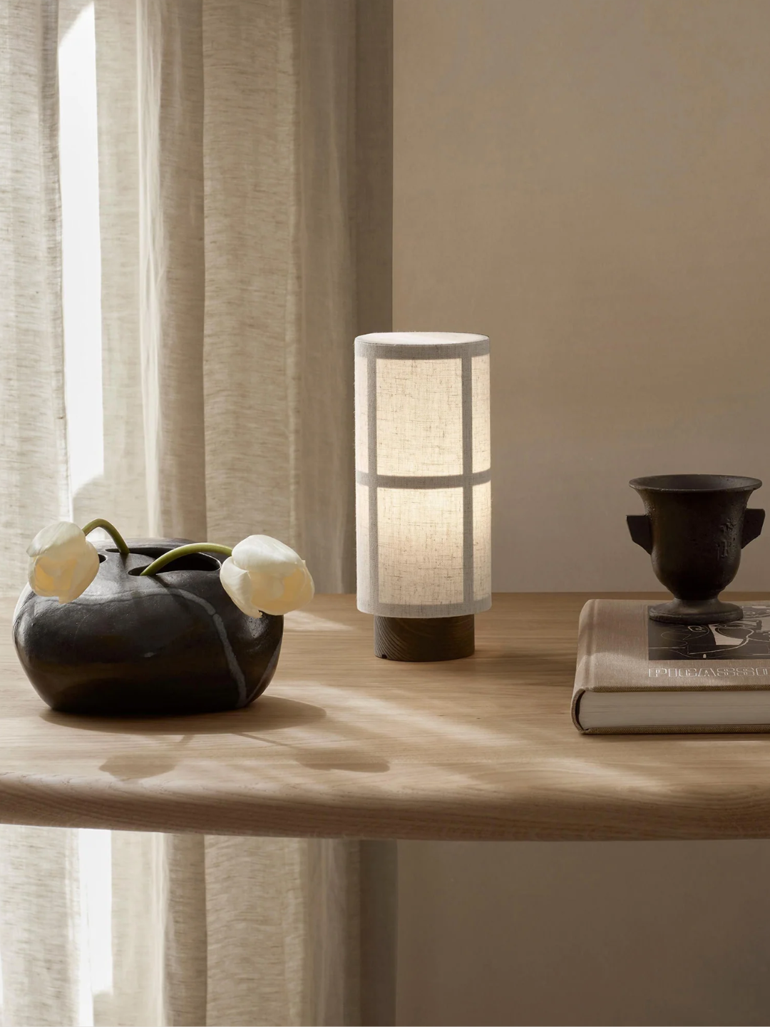 A dimmable portable linen table lamp from Audo Copenhagen