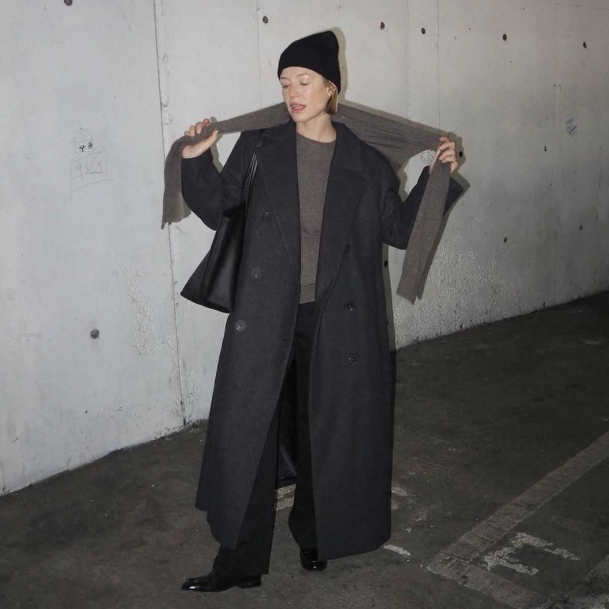 wearing a chic, minimalist outfit 