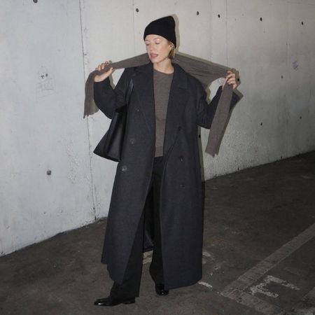 wearing a chic, minimalist outfit 