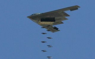This stealth bomber, the B-2 Spirit, drops 500-pound bombs during a U.S. Air Force firepower demonstration