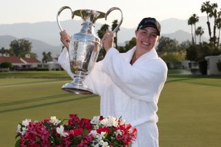 Jennifer Kupcho holds the Chevron Championship trophy