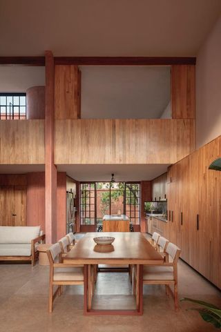 casa roja, a red house by angel garcia in mexico with indoor outdoor areas and terraces anda brutalist exposed concrete in red tone