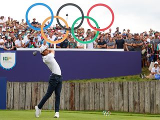 Joaquin Niemann hitting a tee shot at the Paris 2024 Olympics