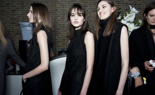 four female models wearing pringle of scotland facing in different directions