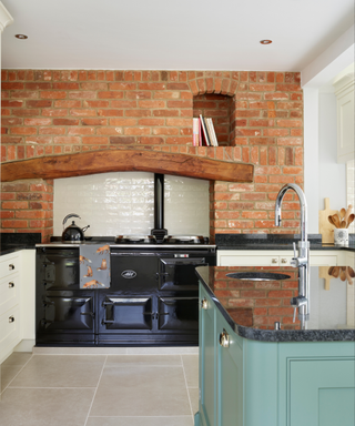 A terracotta range hood with a built-in chimney and oven