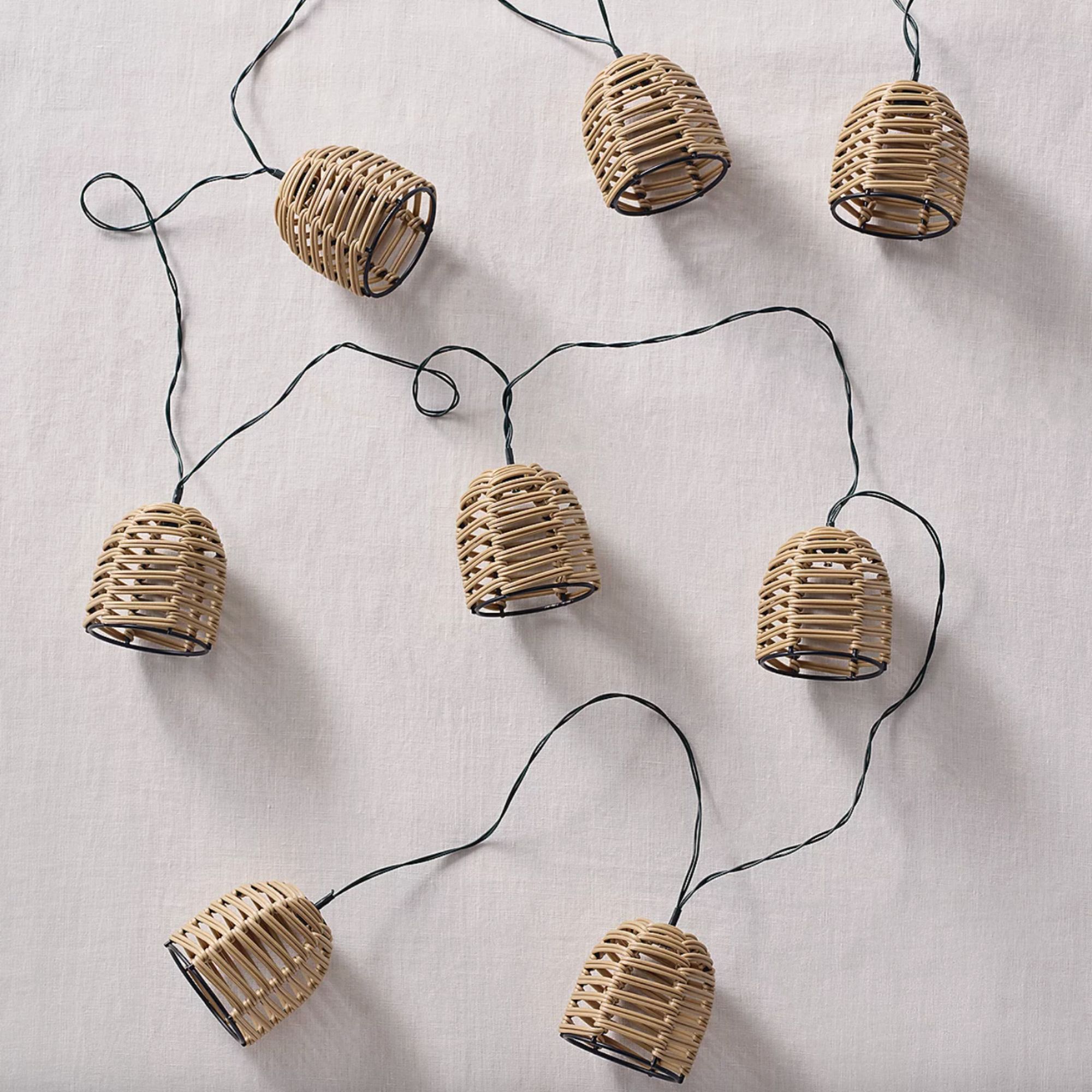 Wicker string lights, mini wicker lanterns on a black string