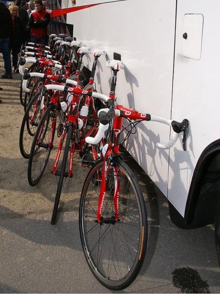 The side of the Caisse d'Epargne bus was awash in red prior to the start.