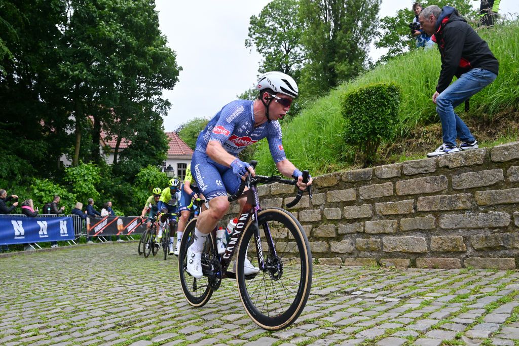 BRUSSELS BELGIUM JUNE 02 Kaden Alexander Groves of Australia and Team AlpecinDeceuninck competes passing through Wall of Geraardsbergen De Muur during the 104th Brussels Cycling Classic 2024 a 2184km one day race from Brussels to Brussels on June 02 2024 in Brussels Belgium Photo by Luc ClaessenGetty Images