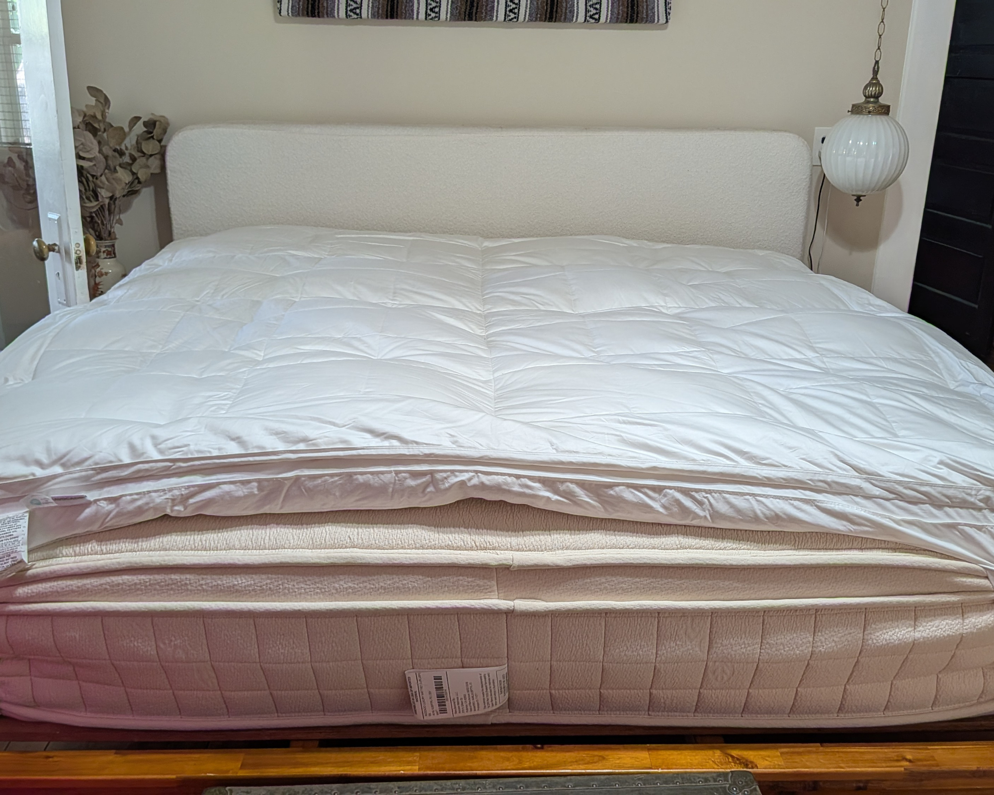 The Avocado Down Mattress Topper on an Avocado mattress.