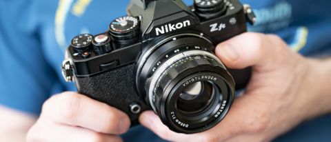 Voigtlander D 35mm f1.2 Nokton lens in the hand on a Nikon Z fc