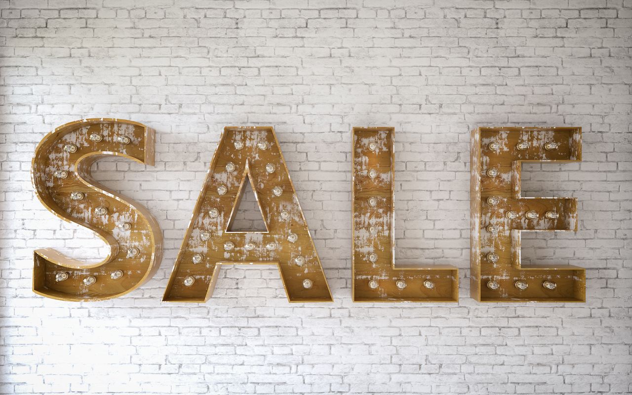 Sale sign with light bulbs