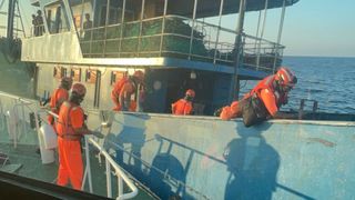 Taiwan Coast Guard officers boarded a suspicious Chinese fishing vessel this weekend