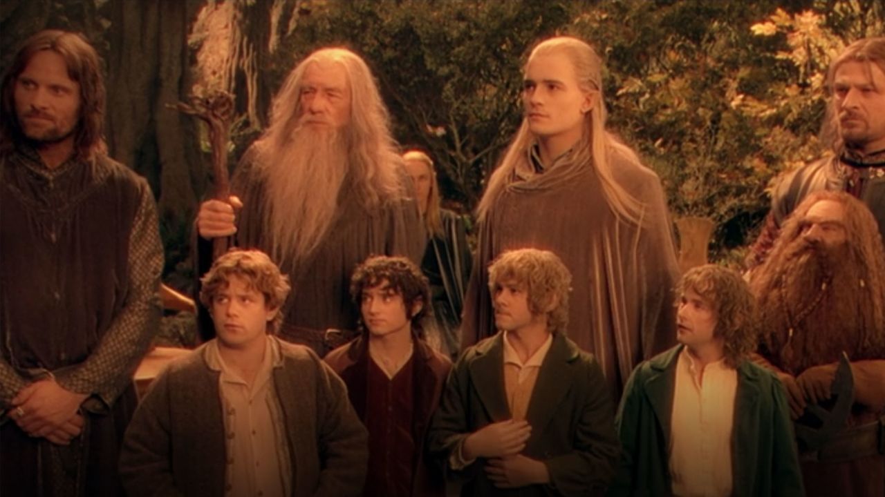 A screenshot of the nine members of The Fellowship of the Ring in the first Lord of the Rings movie