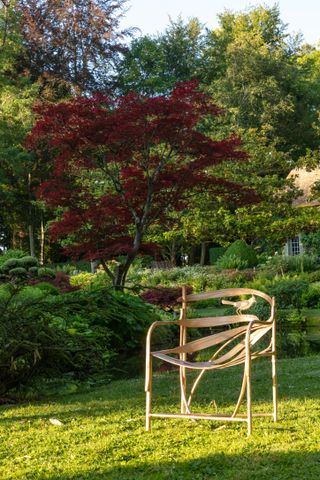 chair from Les Lalanne Sotheby's sale, seen in garden