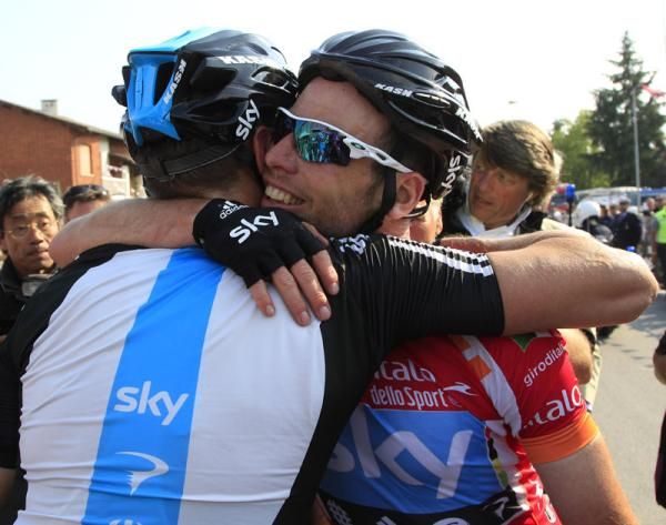 Cavendish gives a Sky teammate a hug after his third win in the race