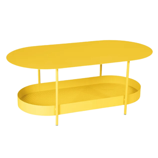 oval yellow coffee table with bottom shelf