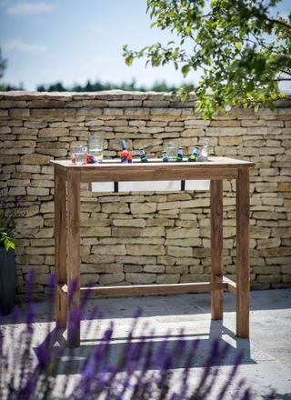 bench with drinks from garden trading